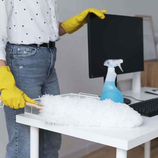 person-taking-care-office-cleaning